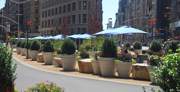 Experimental carriageway change -- planters, reallocation of space etc (NYC)