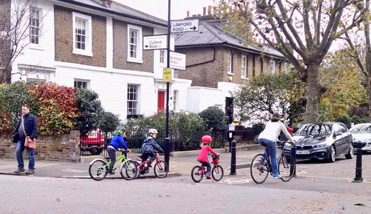 Pedestrians and child cyclists move easily through filtered streets